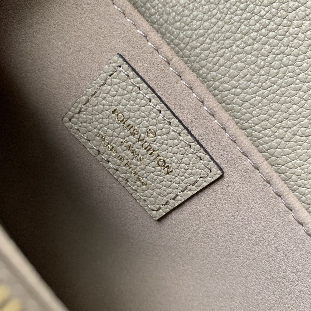 Louis Vuitton Pochette Métis East West - Monogram Empreinte Leather - Tourterelle/Crème