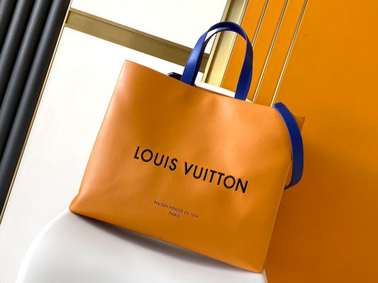 Authentic Louis Vuitton Orange Paper Shopping Bag with Blue Handles