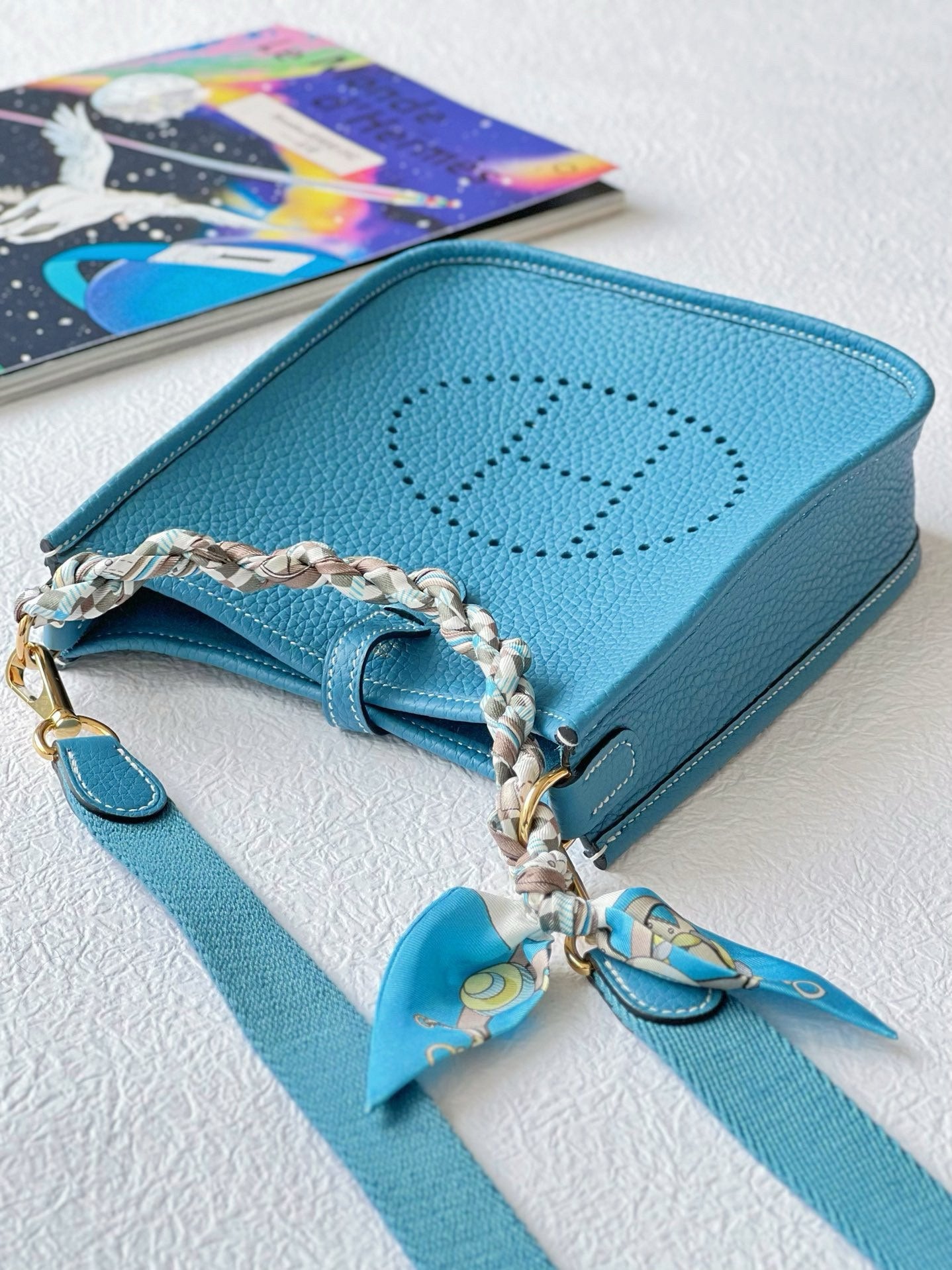 Turquoise Blue Perforated Leather Crossbody Bag with Pegasus Charm & Chain Handle