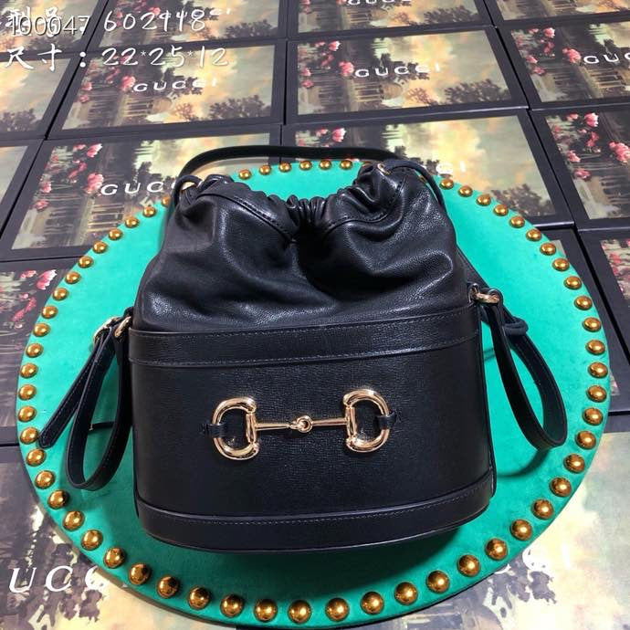 Classic Black Leather Drawstring Bucket Bag with Adjustable Shoulder Strap
