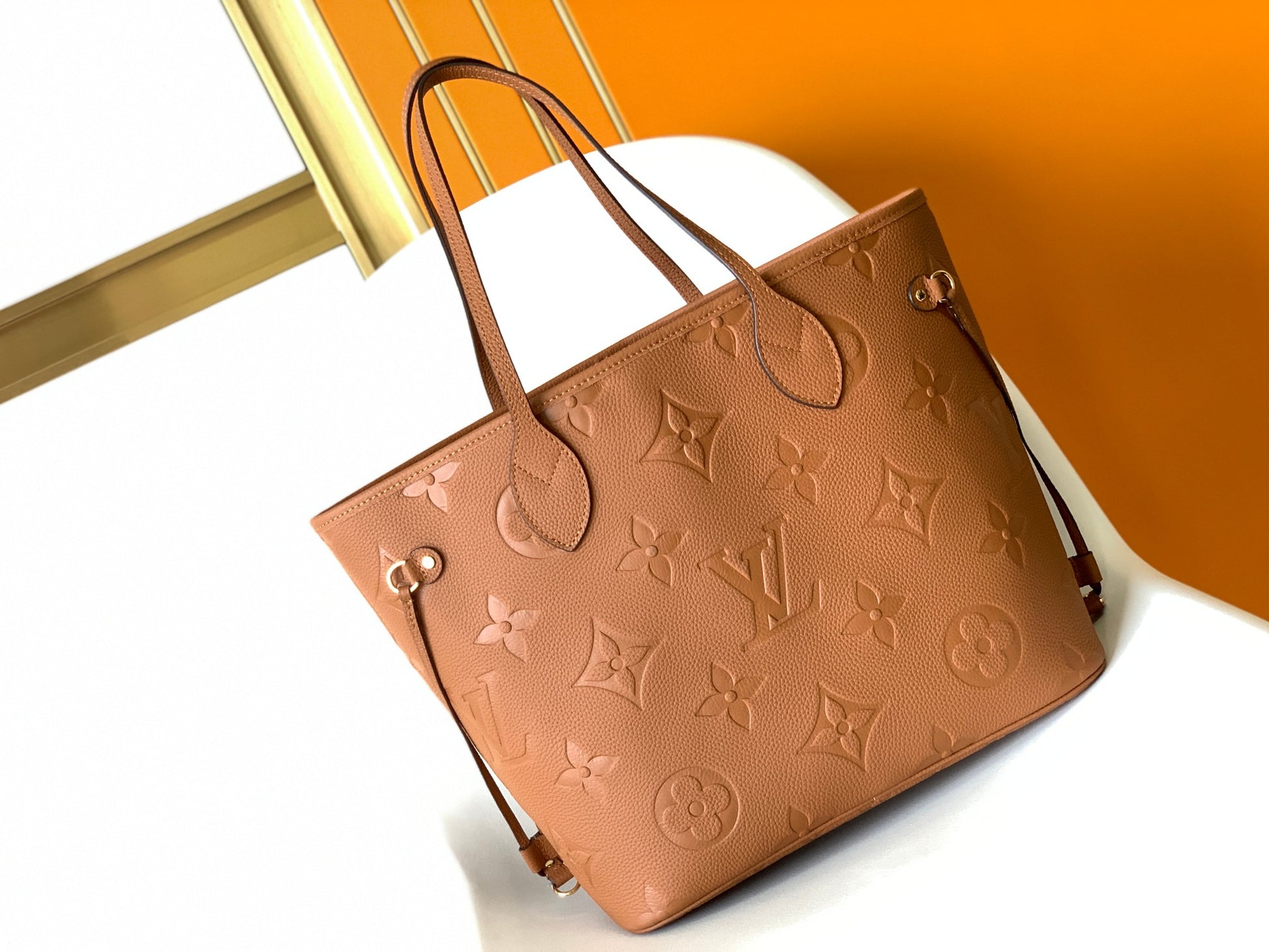 Brown Floral Embossed Leather Tote Bag with Side Drawstrings