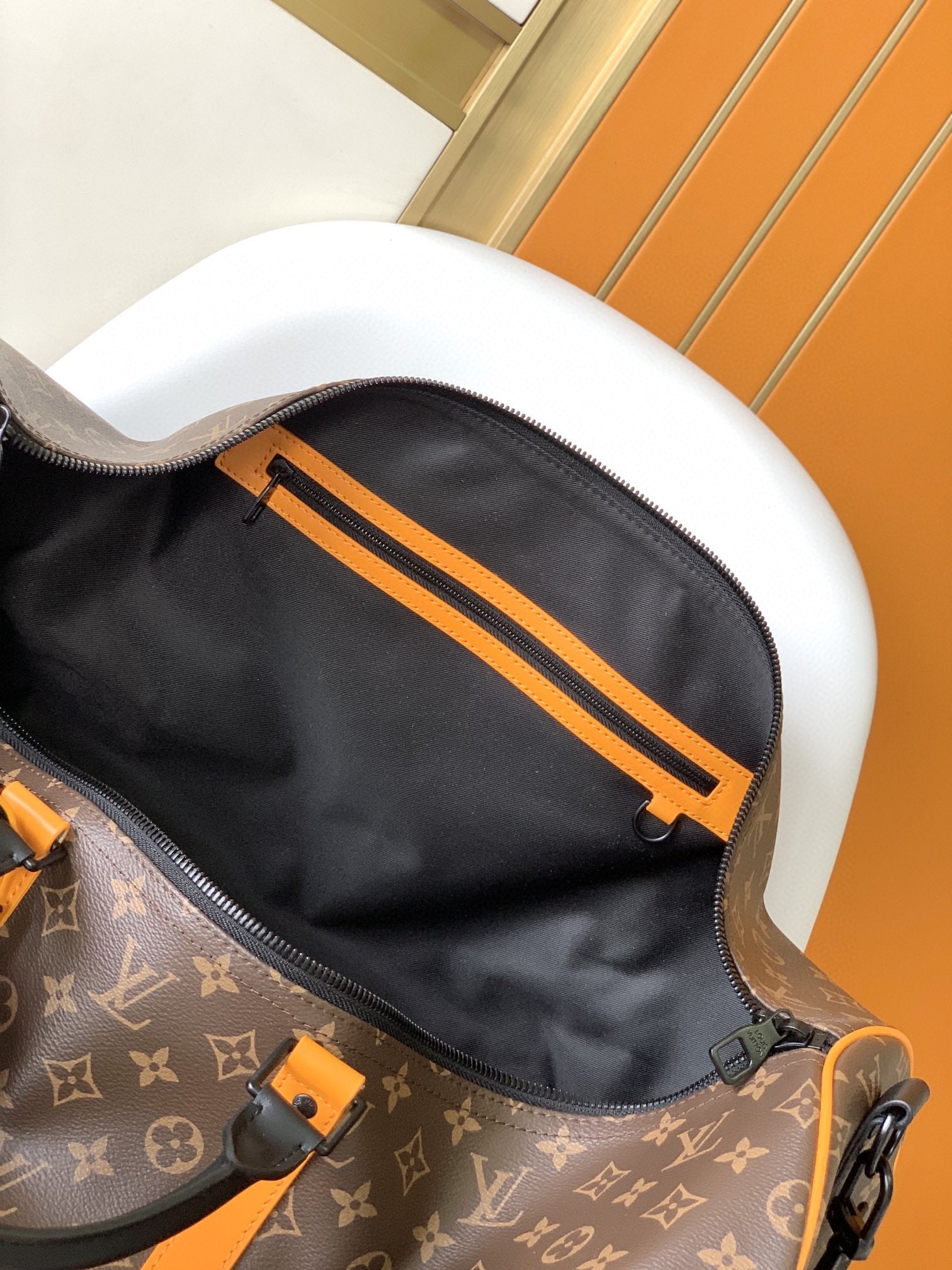 Louis Vuitton Keepall Bandoulière Monogram Canvas with Orange Trim Travel Bag