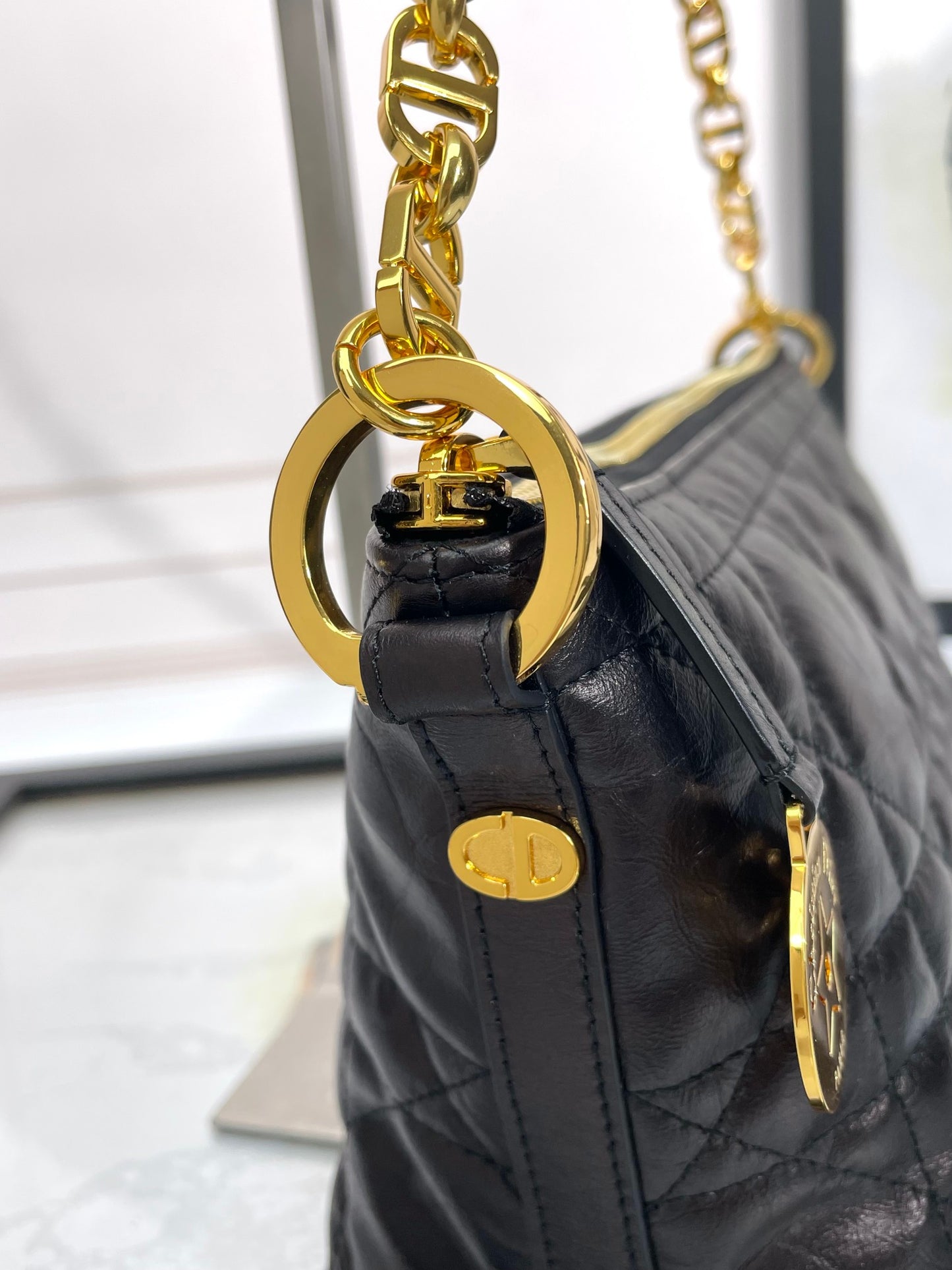 Elegant Black Quilted Leather Shoulder Bag with Gold Chain Strap