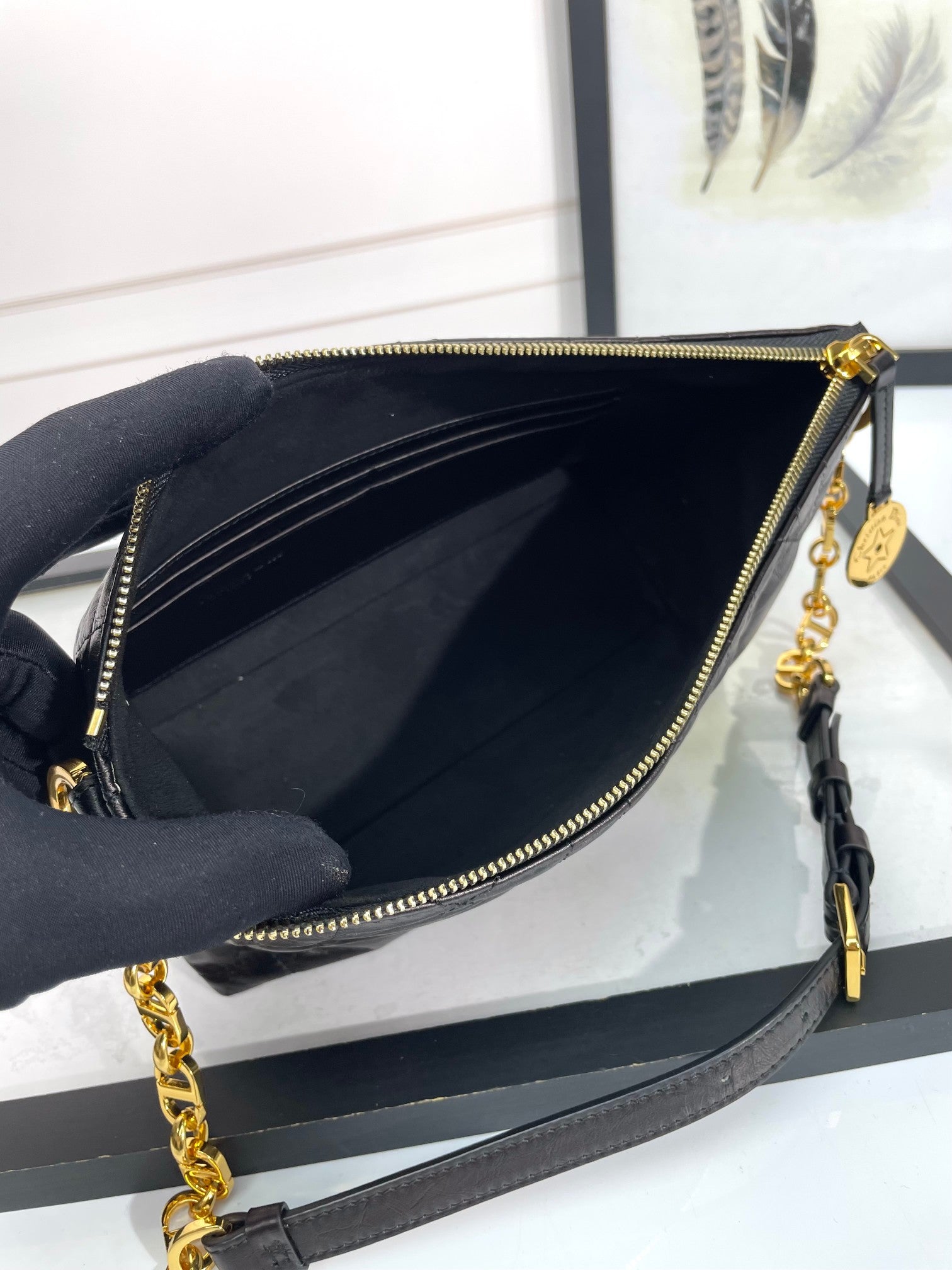 Elegant Black Quilted Leather Shoulder Bag with Gold Chain Strap