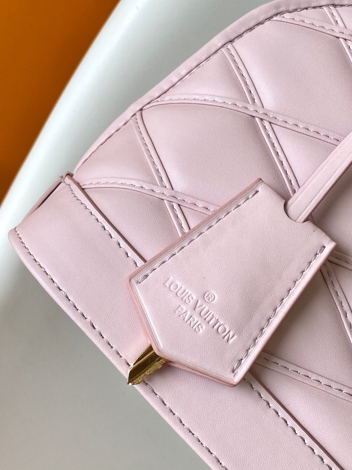 Luxury Quilted Pink Leather Dome Handbag with Gold-Tone Hardware