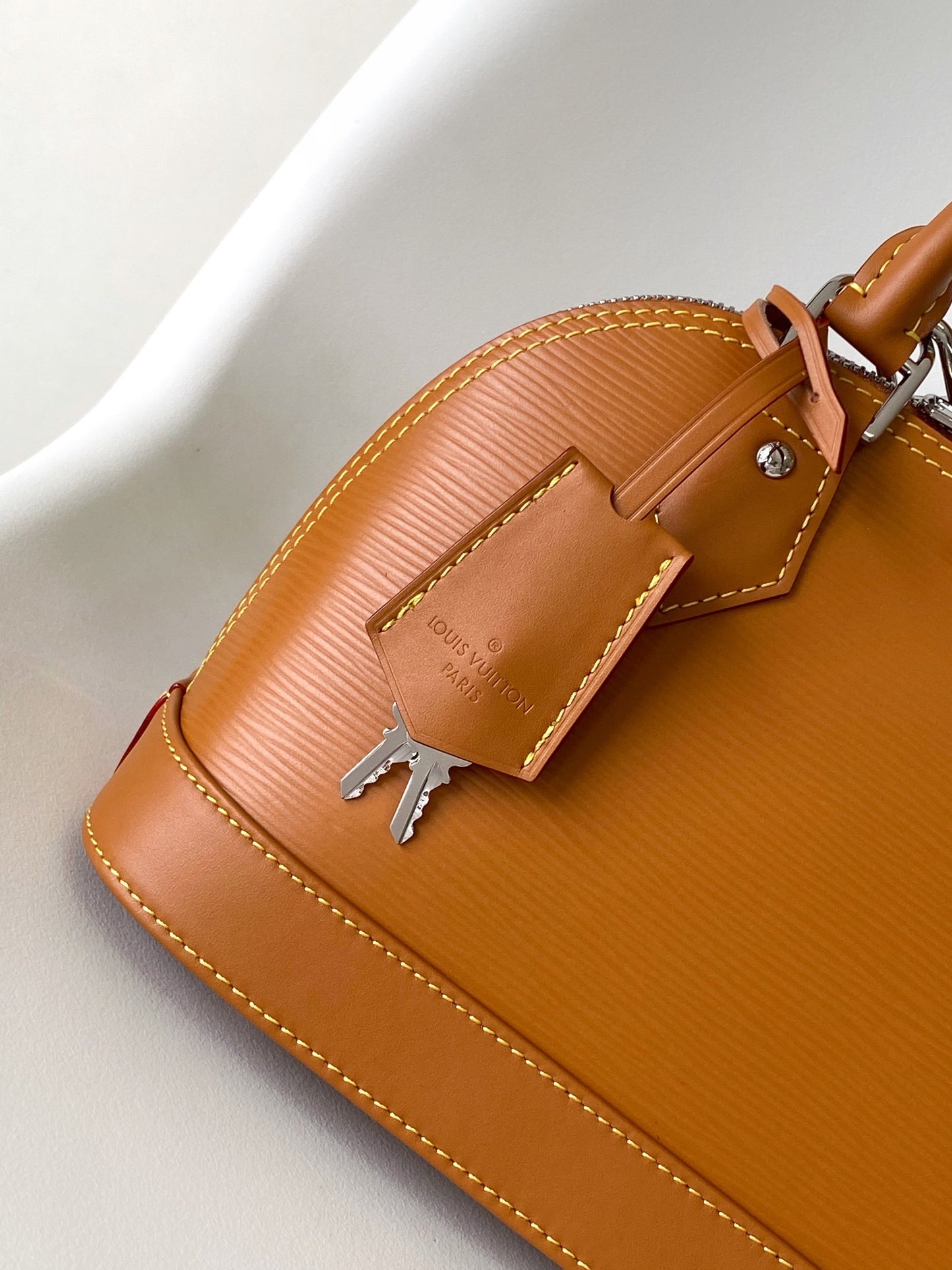 Louis Vuitton Alma BB Epi Leather Handbag with Jacquard Strap - Tan