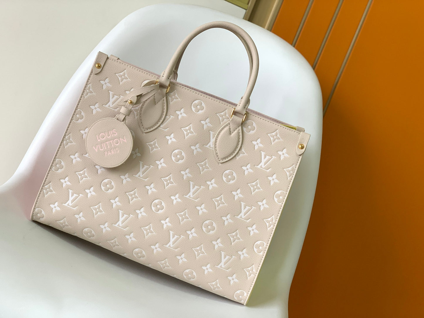 Louis Vuitton OnTheGo MM Monogram Empreinte Leather Tote Bag - Pink