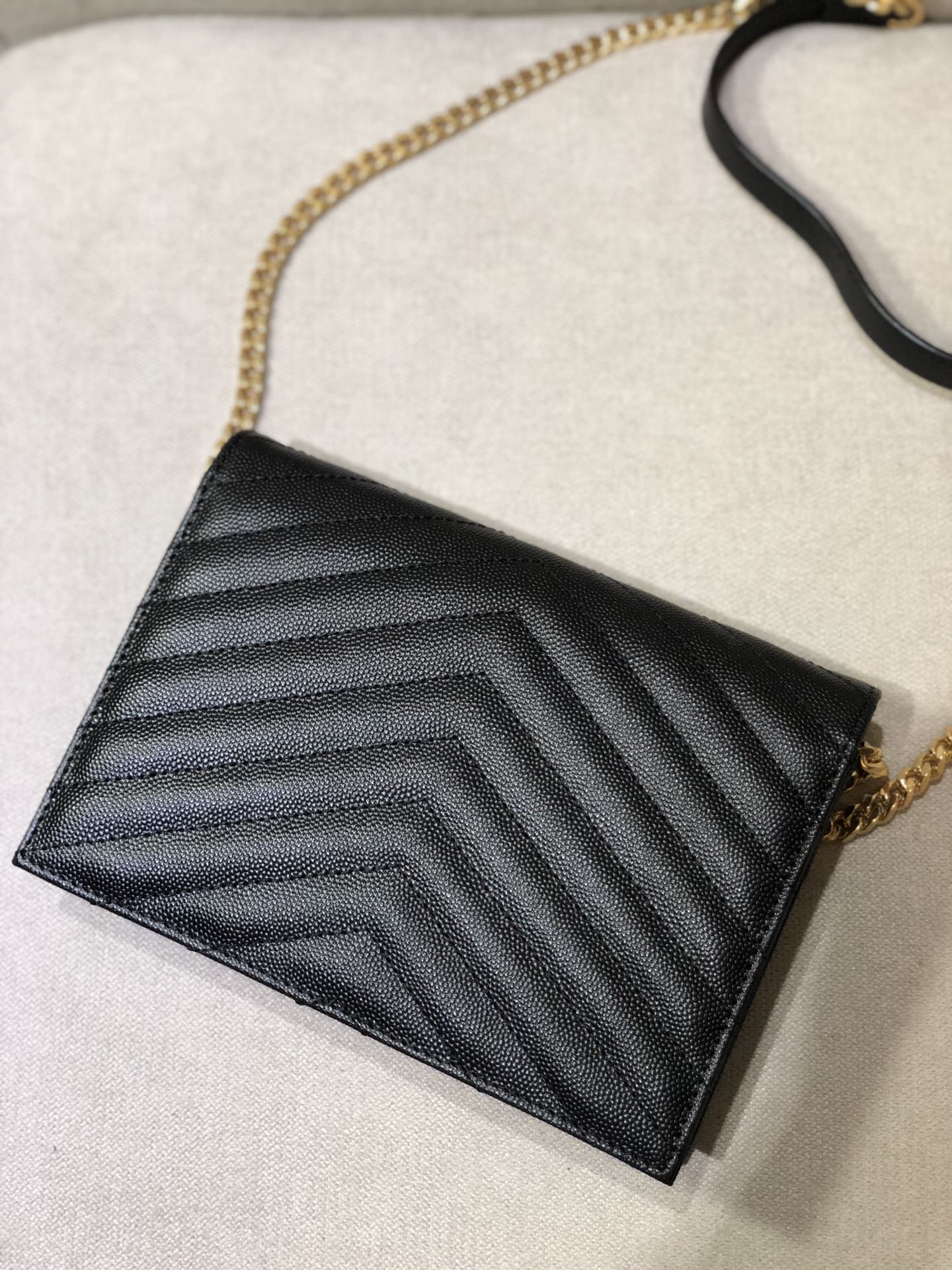 Saint Laurent Cassandre Matelassé Chain Wallet in Grain de Poudre Embossed Leather - Black