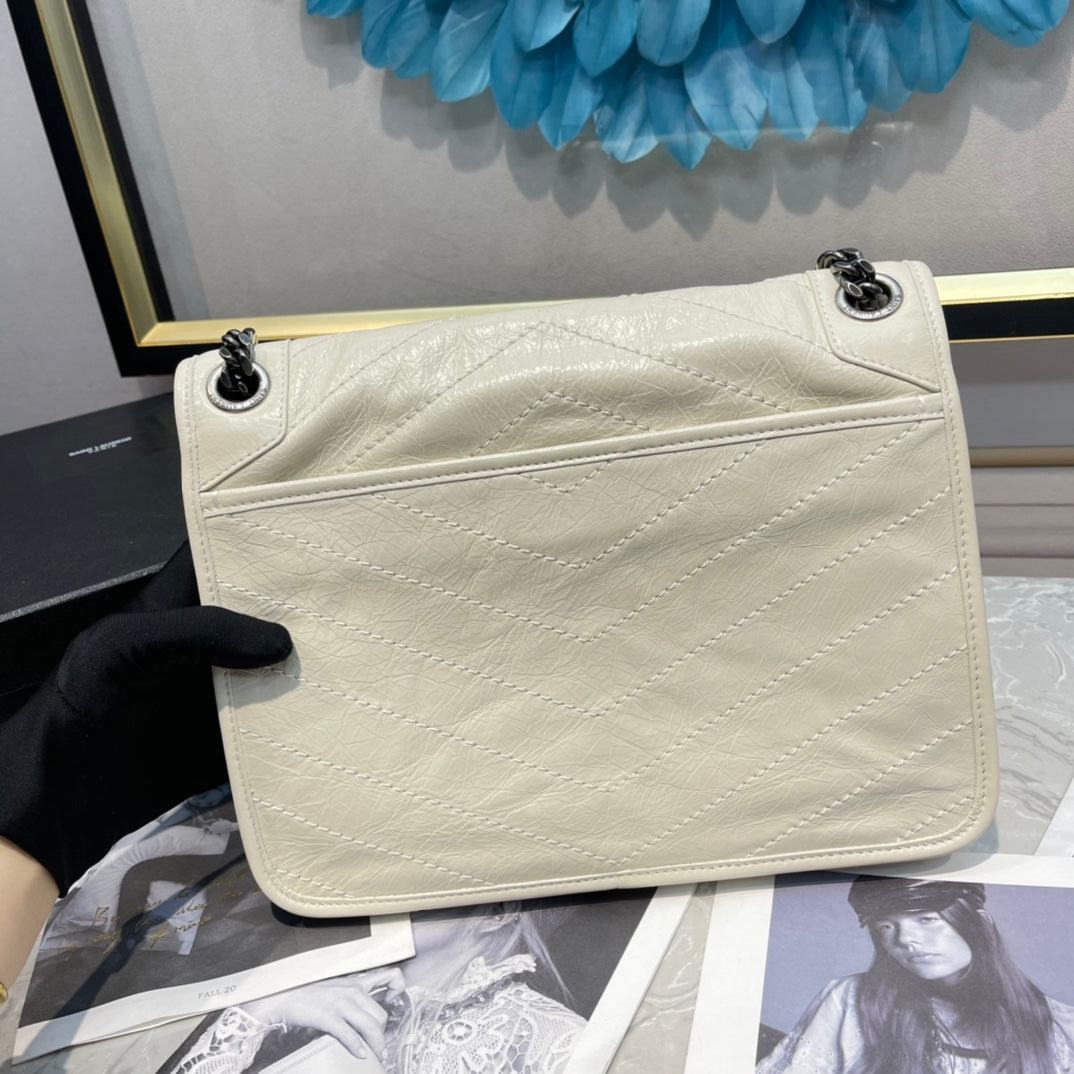 Saint Laurent Niki Medium Shoulder Bag in Quilted Vintage Leather - Cream