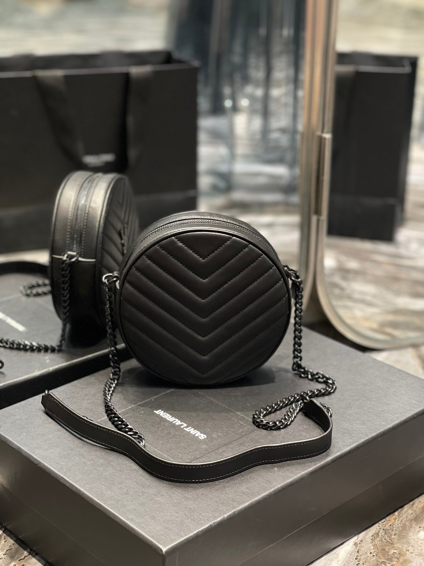 Saint Laurent Vinyle Round Camera Bag in Chevron-Quilted Leather - Black