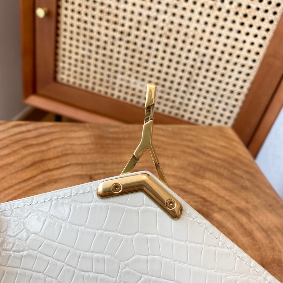 Saint Laurent Cassandra Medium Top Handle Bag in Crocodile-Embossed Leather - White
