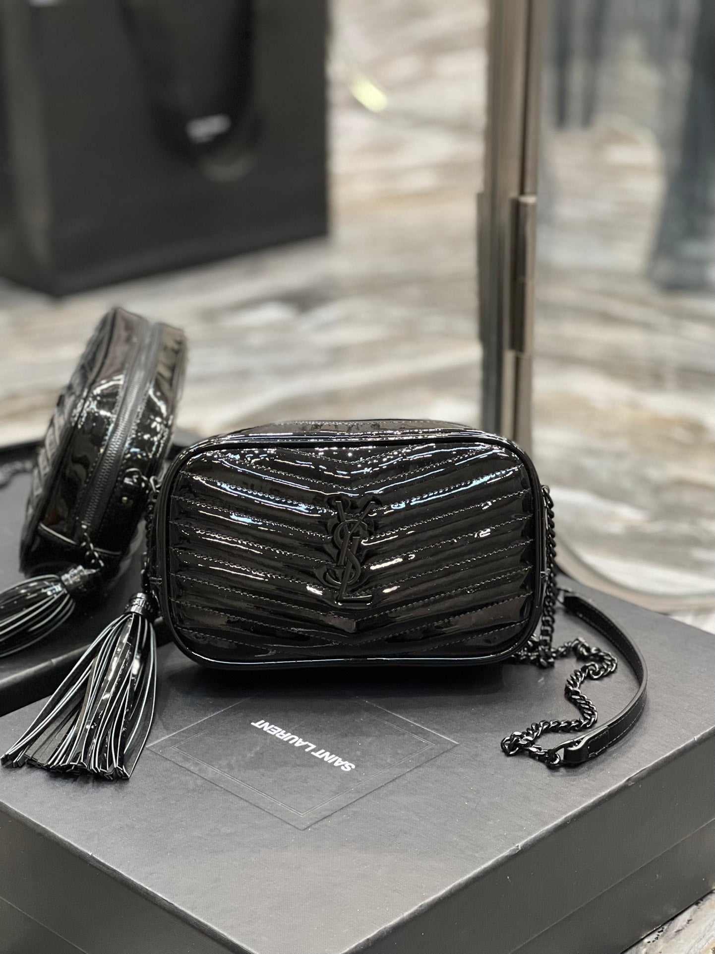 Quilted Black Patent Leather Crossbody Camera Bag with Tassel and Chain Strap