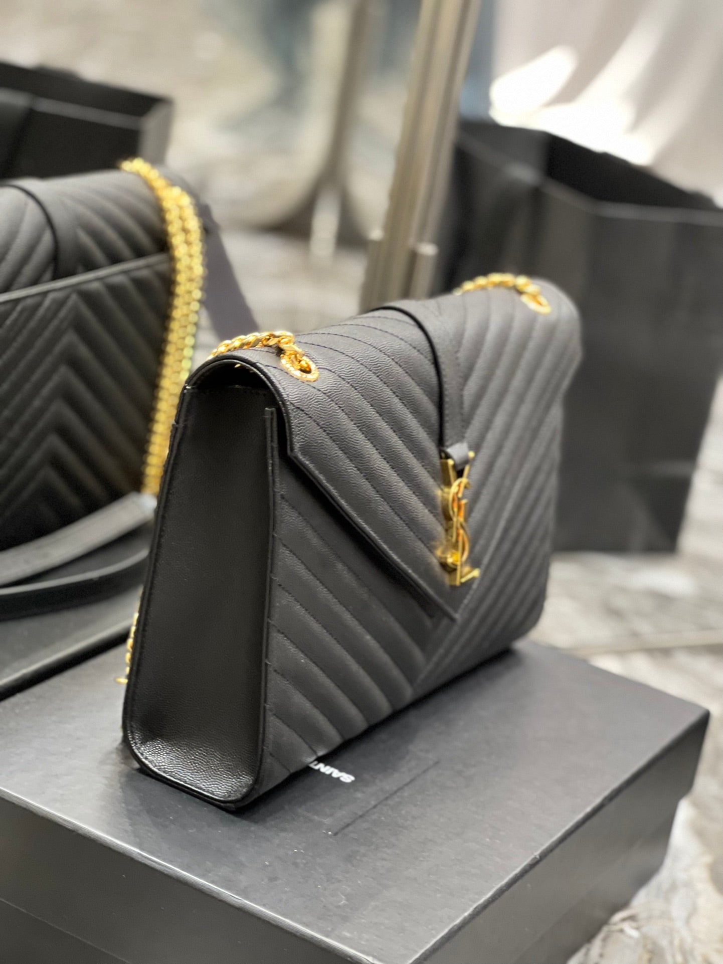 Saint Laurent Monogram Medium Envelope Bag in Black Quilted Leather with Gold Hardware