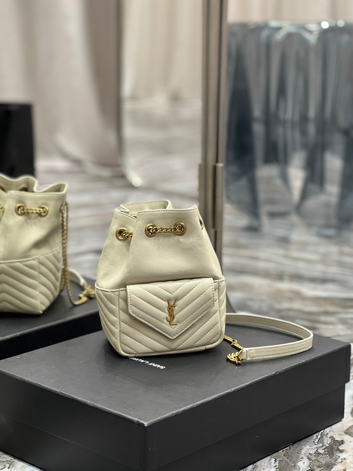 Saint Laurent Joe Mini Bucket Backpack in Quilted Leather - Beige