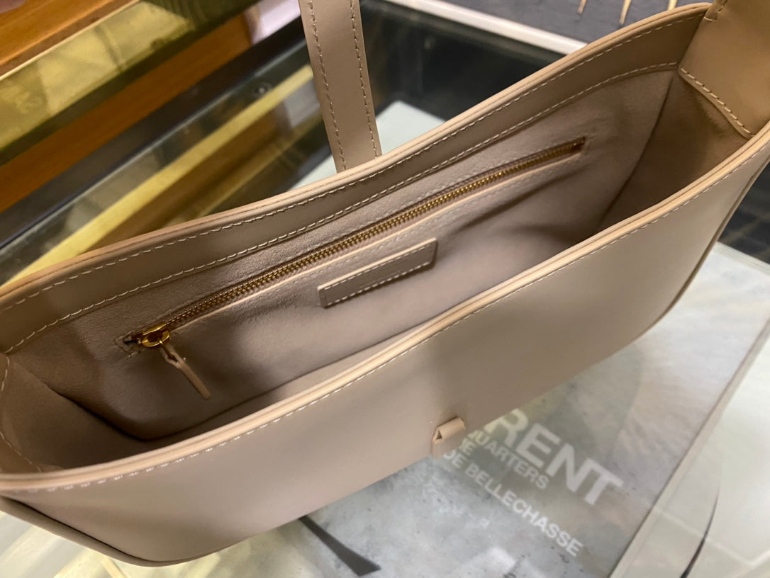 Saint Laurent Le 5 à 7 Leather Hobo Bag in Beige