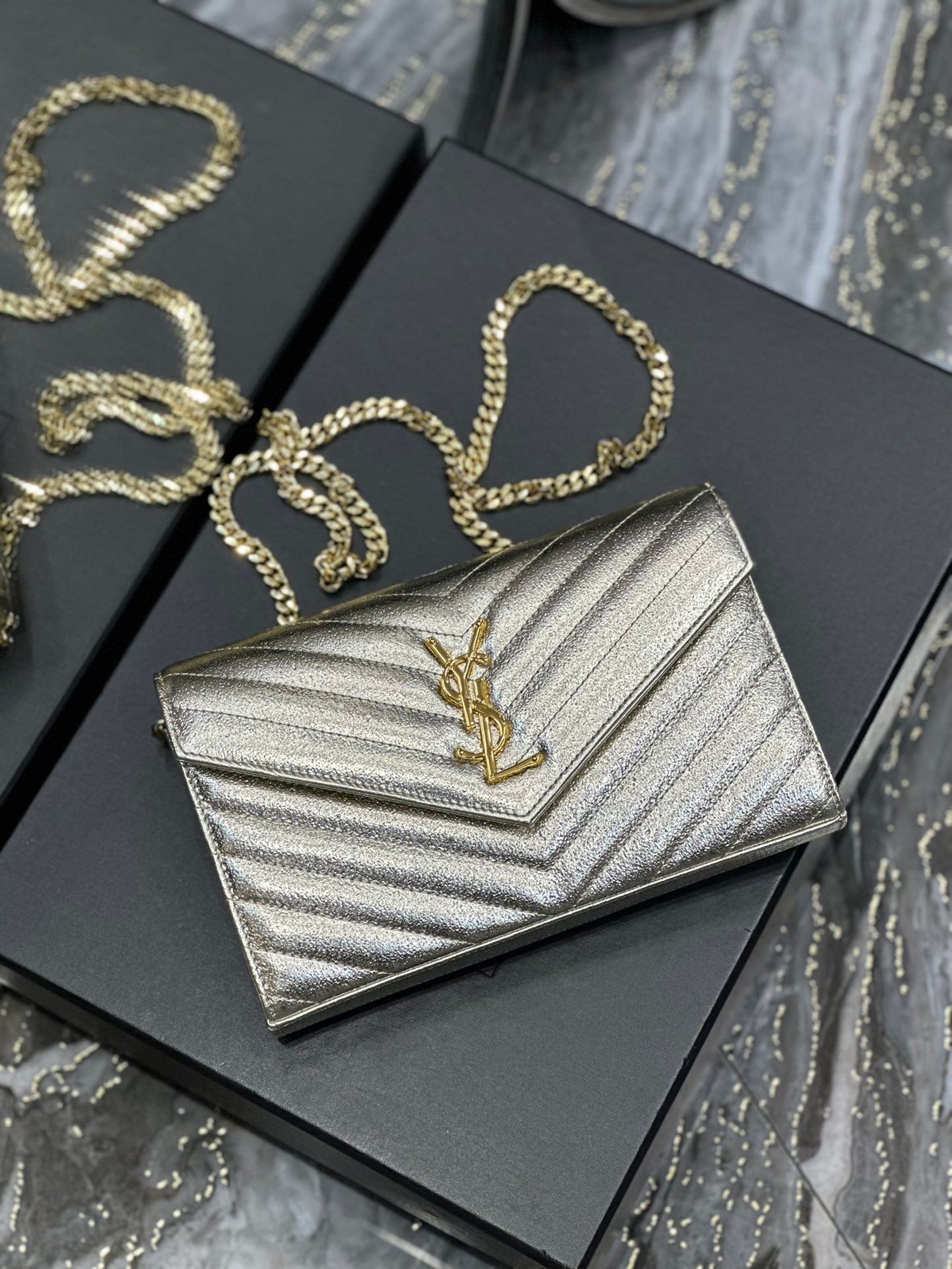Saint Laurent Cassandre Matelassé Chain Wallet in Gold Leather