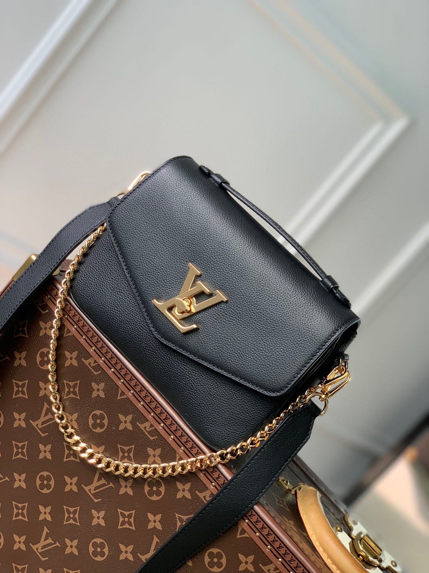 Elegant Black Crossbody Bag with Gold-Tone Hardware and Top Handle