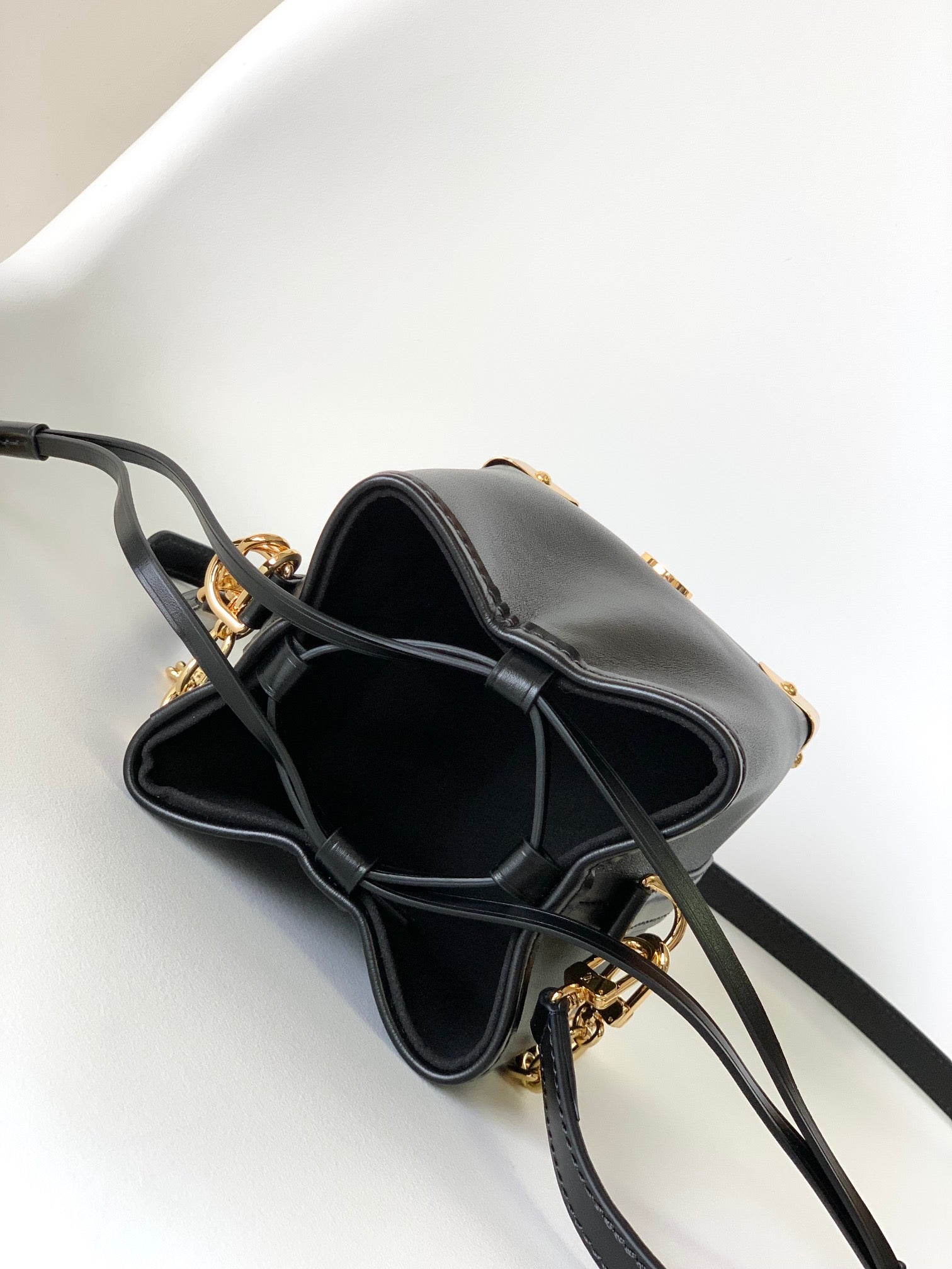 Louis Vuitton Black Leather Bucket Handbag with Gold-Tone Hardware & Chain