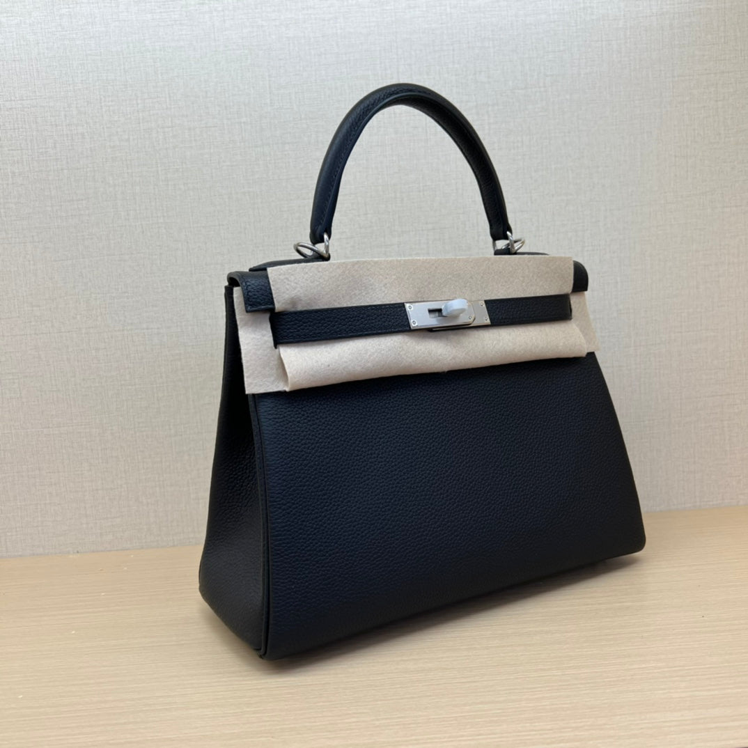 Elegant Black Leather Top-Handle Handbag with Silver-Tone Hardware
