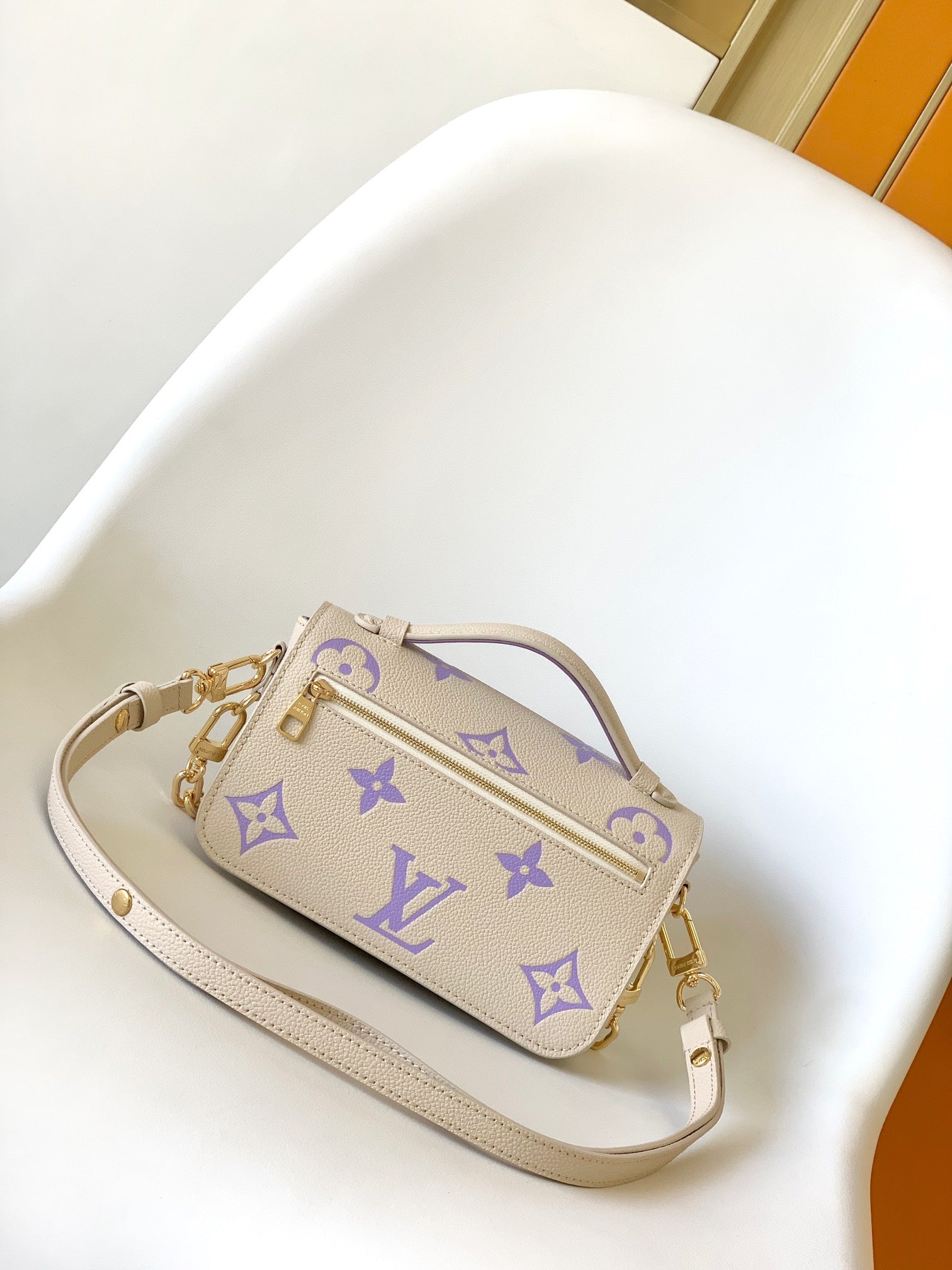 Louis Vuitton Pochette Métis East West Monogram Empreinte Leather Handbag - Beige/Purple