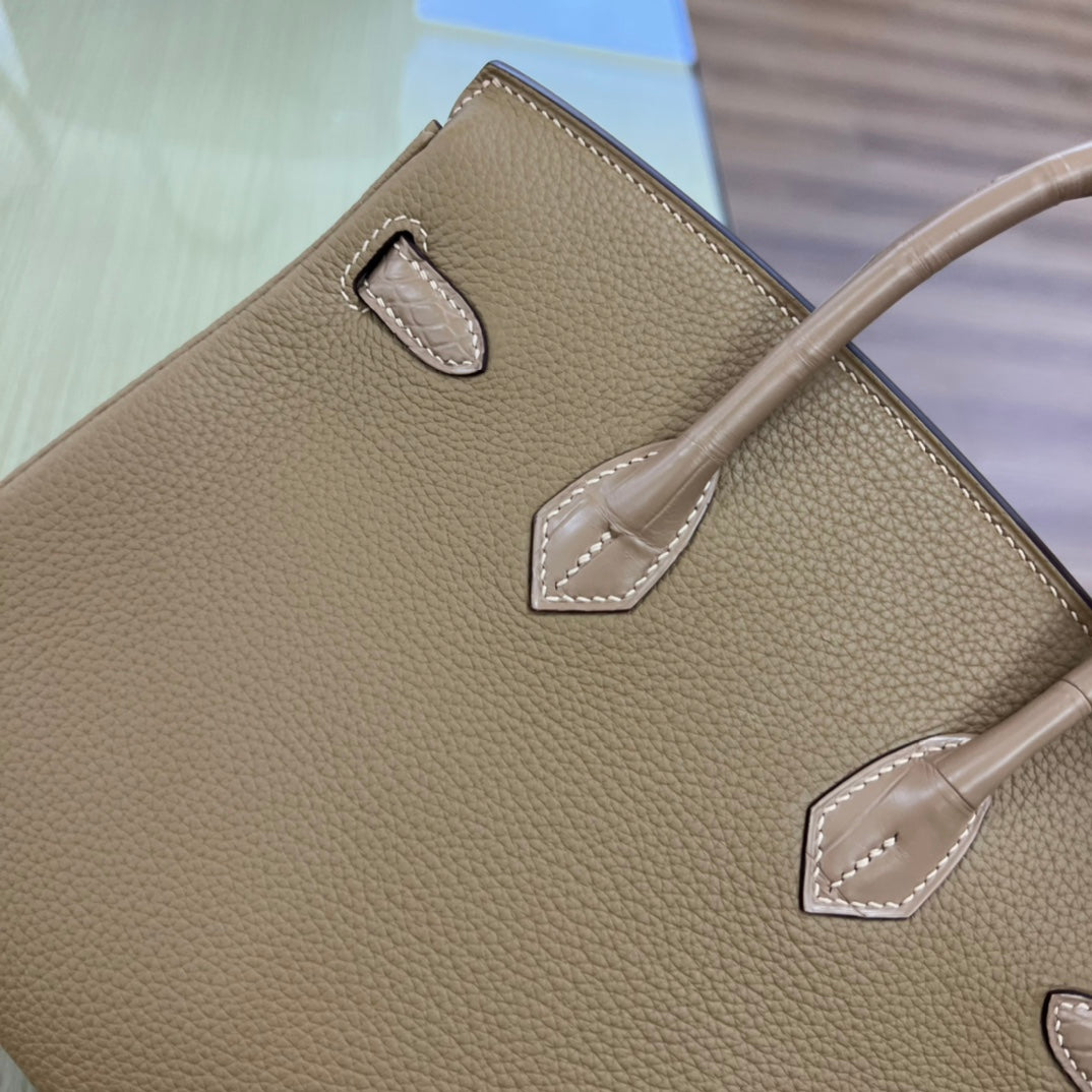 Elegant Tan Leather Handbag with Crocodile Embossed Trim and Gold Hardware