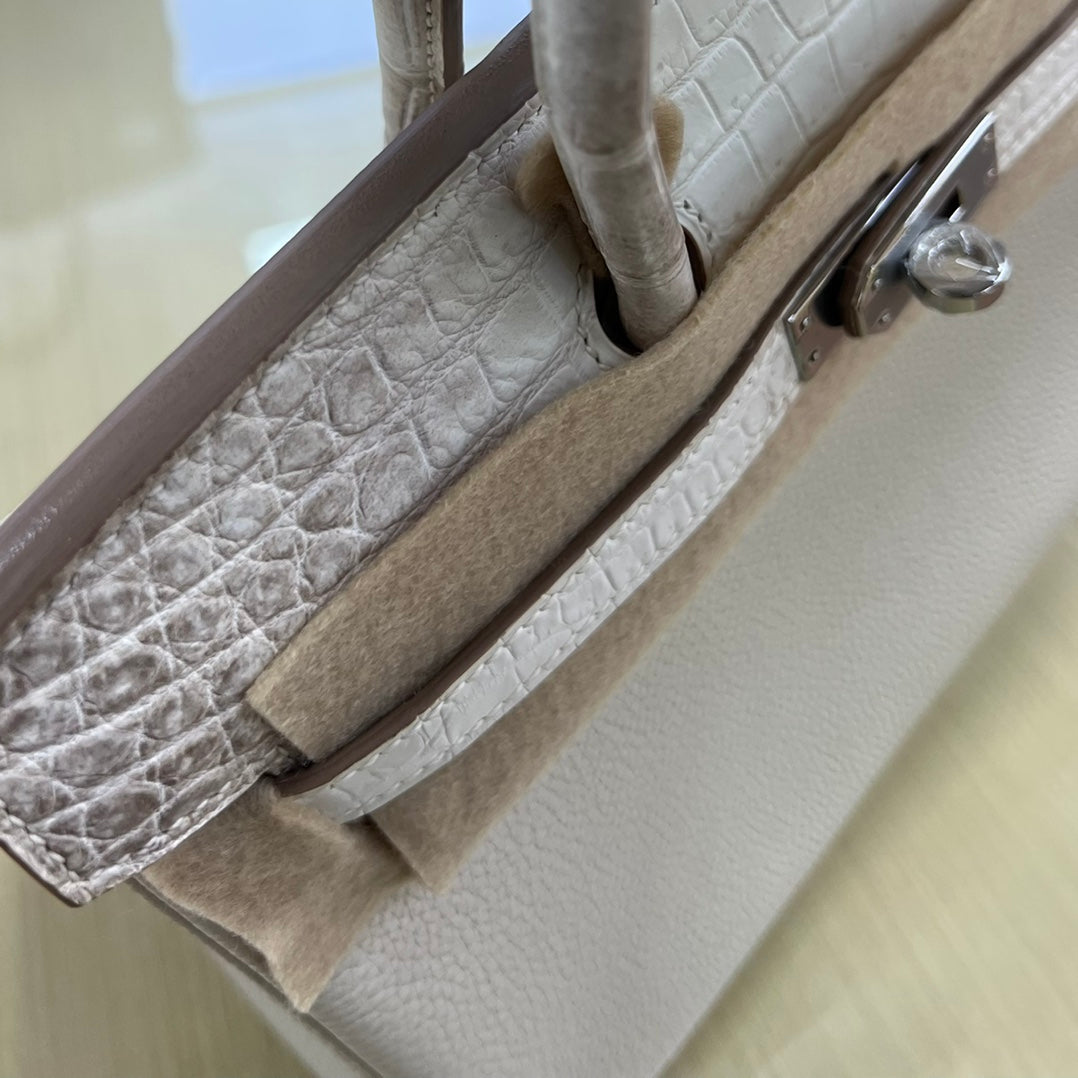 Elegant Cream Leather Top Handle Handbag with Textured Accents