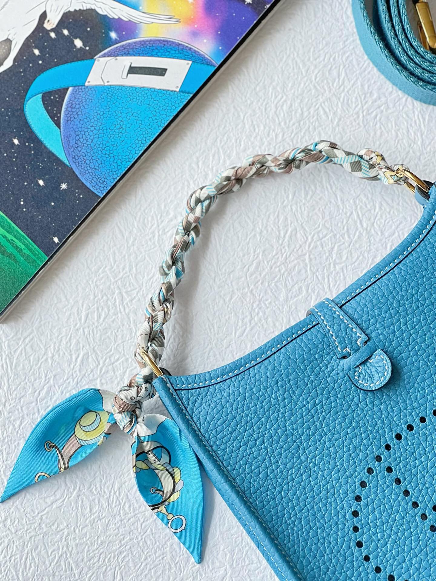 Turquoise Blue Perforated Leather Crossbody Bag with Pegasus Charm &amp; Chain Handle