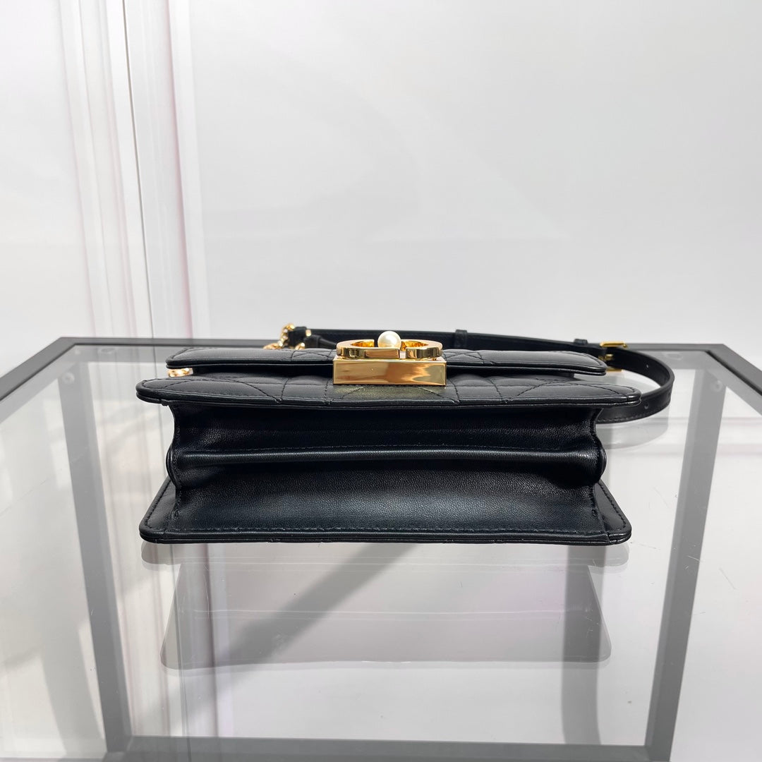 Black Quilted Leather Top Handle Handbag with Gold-Tone Hardware