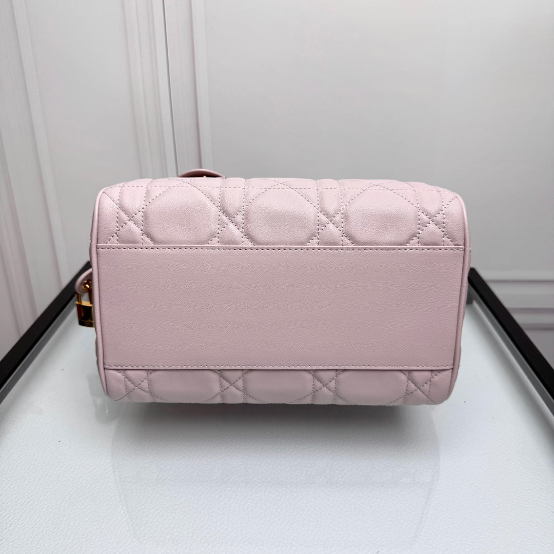 Women's Light Pink Quilted Leather Bowling Bag with Star Charm and Shoulder Strap