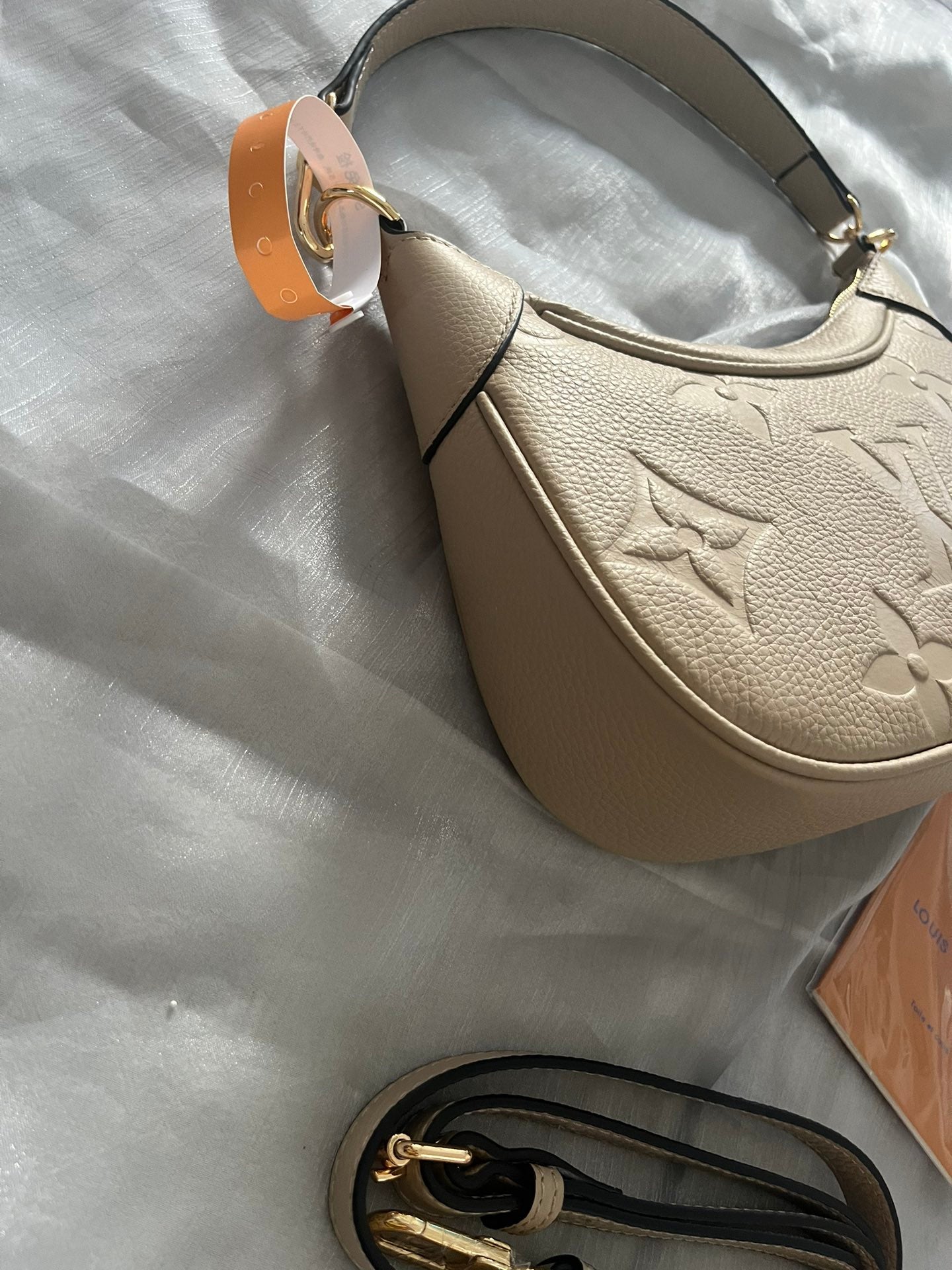 Louis Vuitton Bagatelle Monogram Empreinte Leather Cream Hobo Bag